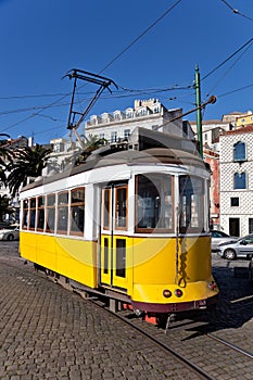 LisbonÃ¢â¬â¢s yellow tram photo